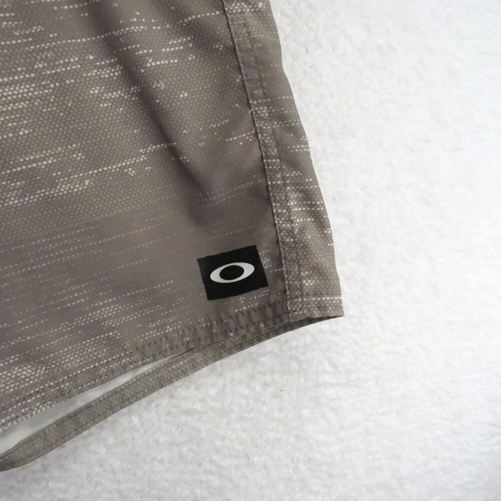 Oakley Swimsuit Mens Size 34 Beige Patterned Boardshorts Drawstring Waist Pocket